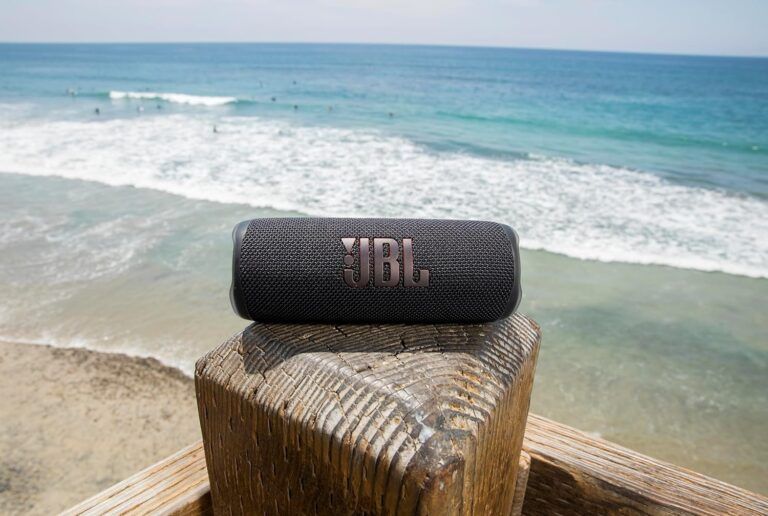 JBL Flip 6 Bluetooth Speaker by the Beach